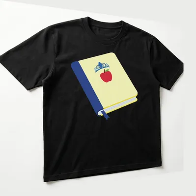 Illustration of a book, apple, and crown in flat design style — printed on a unisex t-shirt (angled view)