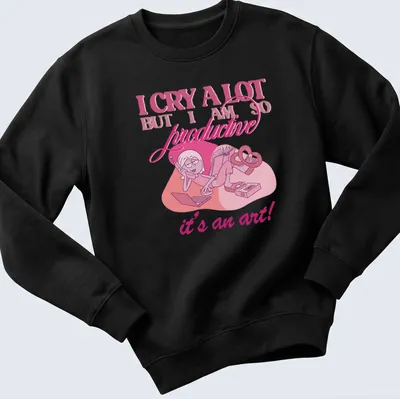 Cute cartoon character crying with text about productivity in pink and white. — printed on a unisex sweatshirt