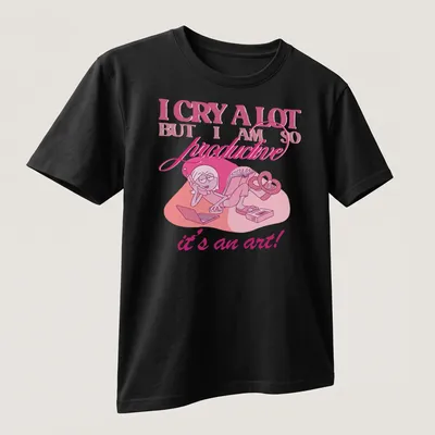 Cute cartoon character crying with text about productivity in pink and white. — printed on a unisex t-shirt (angled view)