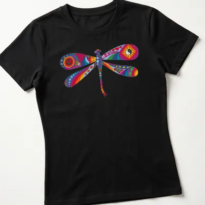 Psychedelic dragonfly illustration in rainbow colors on a — printed on a women's shirt