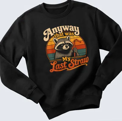 Retro vintage print of a raccoon holding a straw with humorous text below — printed on a unisex sweatshirt