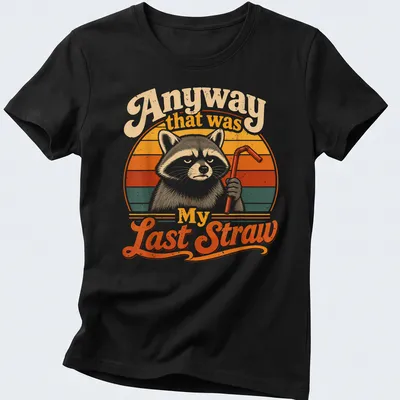 Retro vintage print of a raccoon holding a straw with humorous text below — printed on a women's shirt