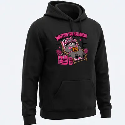 Cartoon raccoon with text 'Waiting For Halloween' in colorful design — printed on a unisex hoodie