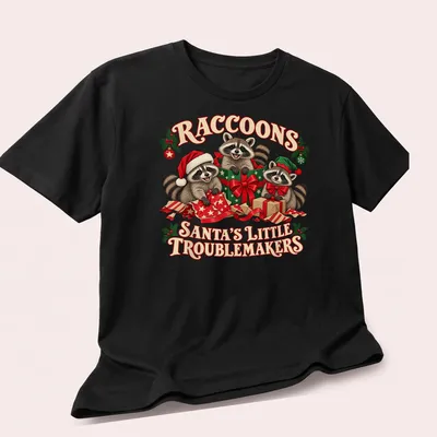Cute festive T-shirt featuring raccoons with Christmas elements and playful text. — printed on a unisex t-shirt (angled view)