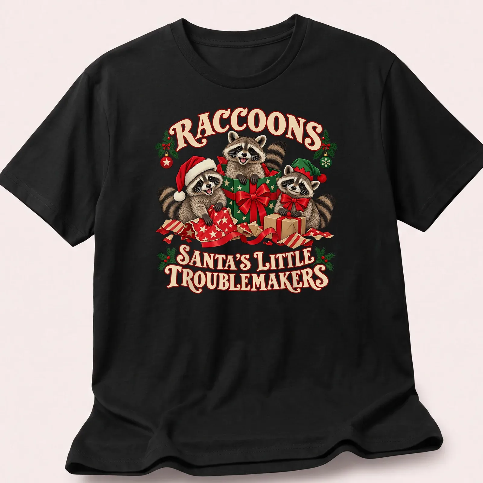 Cute festive T-shirt featuring raccoons with Christmas elements and playful text. — printed on a unisex t-shirt