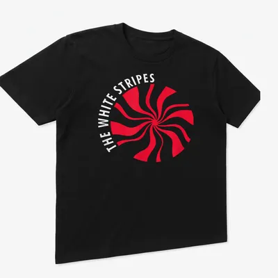 Bold graphic print of The White Stripes text over a red swirl design — printed on a unisex t-shirt (angled view)