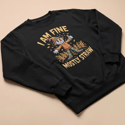 Cartoonish scarecrow with a cheerful grin and text 'I AM FINE MOSTLY STRAW' in bright colors — printed on a unisex sweatshirt