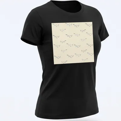 Watercolor design of seagulls in light beige and gray against a light blue background. — printed on a women's shirt