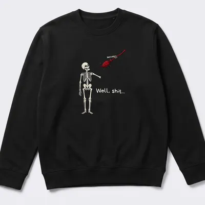 Cartoon skeleton holding broom with humorous text above in beige, red, and black — printed on a unisex sweatshirt