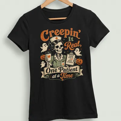 Humorous skeleton nurse graphic with Halloween theme featuring text — printed on a women's shirt