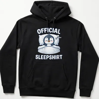 Kawaii cartoon of a sleeping penguin with the text 'Official Sleepshirt' above. — printed on a unisex hoodie