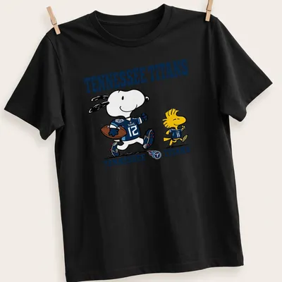 Cartoon Snoopy and Woodstock on Tennessee Titans football t-shirt in blue, white, and yellow