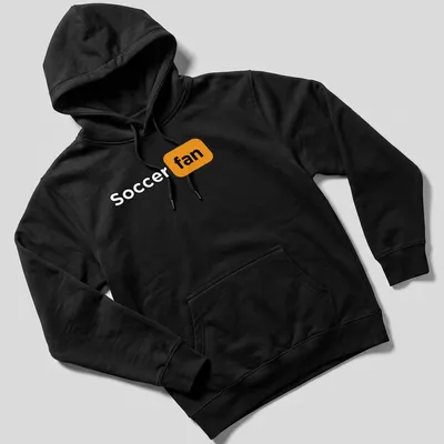 Bold modern typography shirt featuring the words Soccer Fan in black, orange, and white. — printed on a unisex hoodie