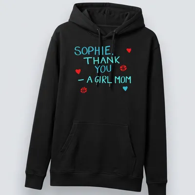 Playful t-shirt with basketball graphics and colorful text celebrating girl moms — printed on a unisex hoodie