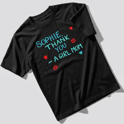 Playful t-shirt with basketball graphics and colorful text celebrating girl moms — printed on a unisex t-shirt