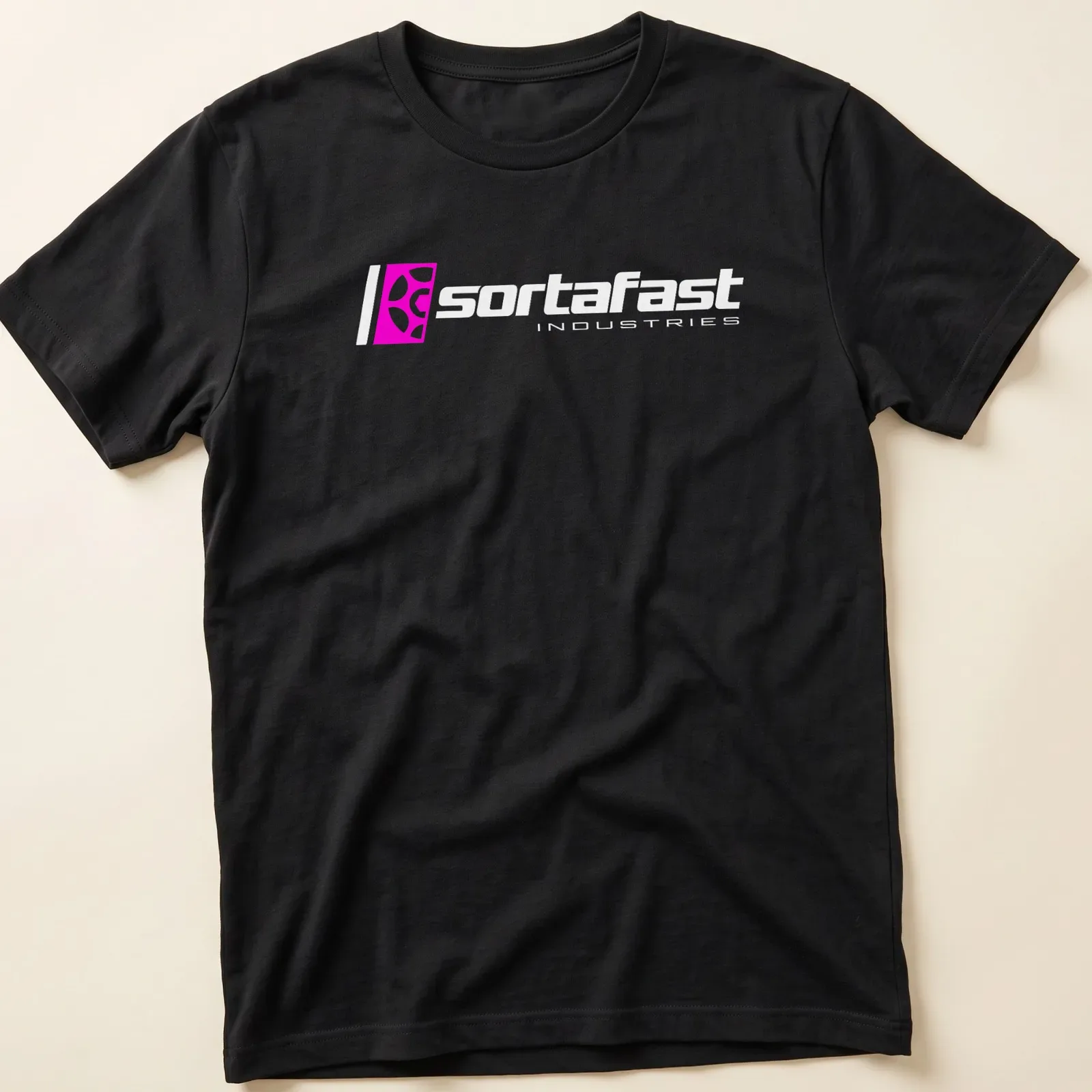 Modern Sortafast Industries logo t-shirt in pink and white — printed on a unisex t-shirt