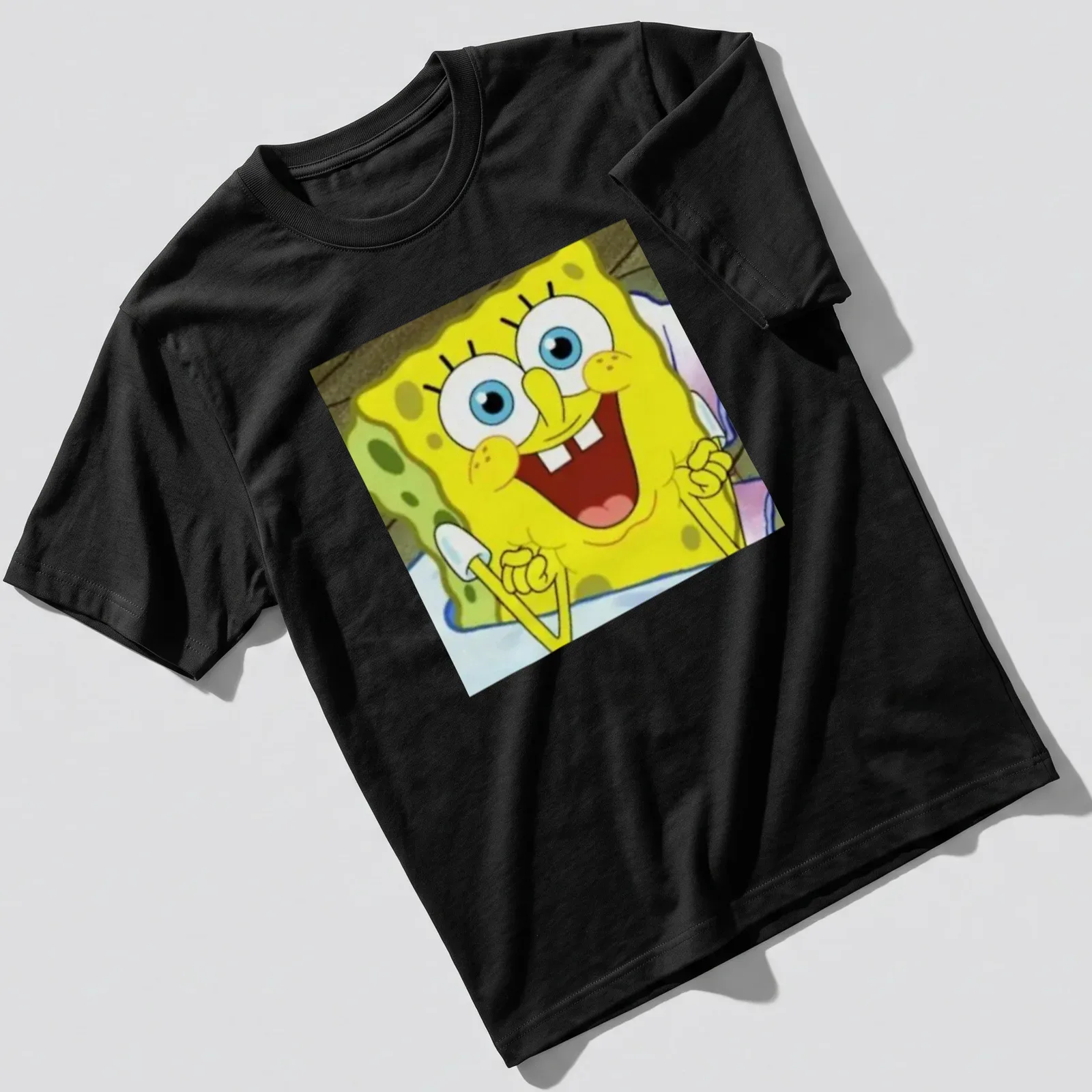 Cartoon design of Spongebob Squarepants in yellow, blue, and white — printed on a unisex t-shirt