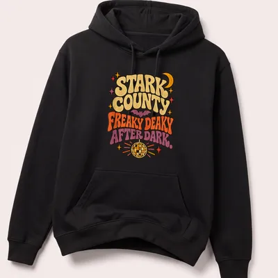 Retro design of a bat under a disco ball with vibrant colors and playful text. — printed on a unisex hoodie