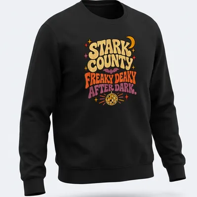 Retro design of a bat under a disco ball with vibrant colors and playful text. — printed on a unisex sweatshirt