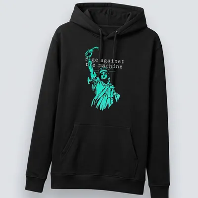 Vintage-style tee featuring the Statue of Liberty with Rage Against the Machine text in turquoise and black — printed on a unisex hoodie