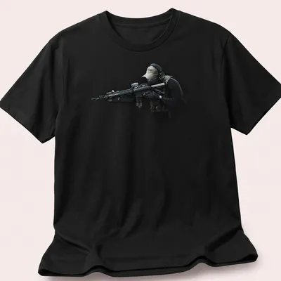 Realistic print of a tactical soldier with a rifle in black, green, tan, and gray — printed on a unisex t-shirt