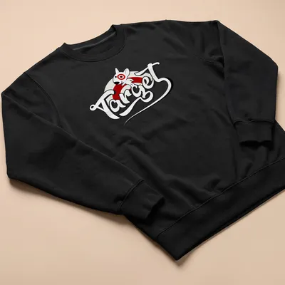 Cartoon style Target Bullseye Dog mascot t-shirt with playful text. — printed on a unisex sweatshirt