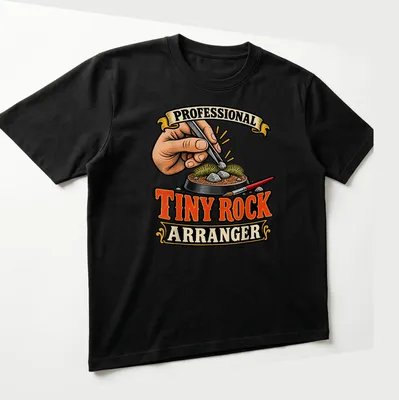 Vintage illustration shirt featuring a hand arranging rocks with tweezers — printed on a unisex t-shirt (angled view)