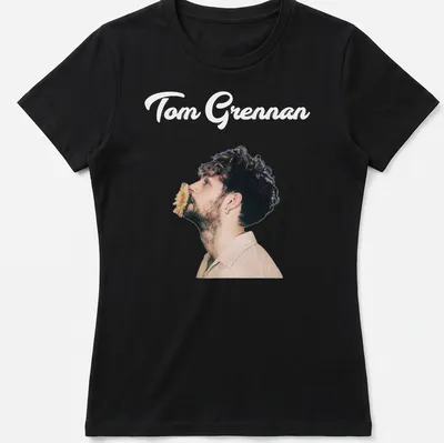Illustration of Tom Grennan in modern portrait style with text in black, beige, and brown. — printed on a women's shirt