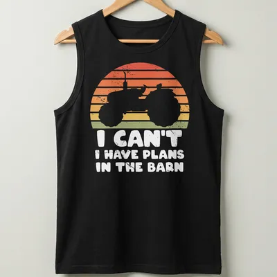 Retro distressed t-shirt featuring tractor silhouette and humorous text about barn plans — printed on a tank top