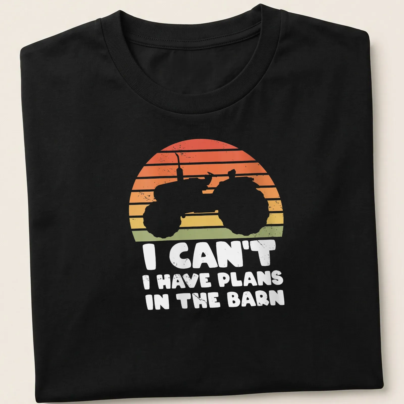 Retro distressed t-shirt featuring tractor silhouette and humorous text about barn plans — printed on a unisex t-shirt