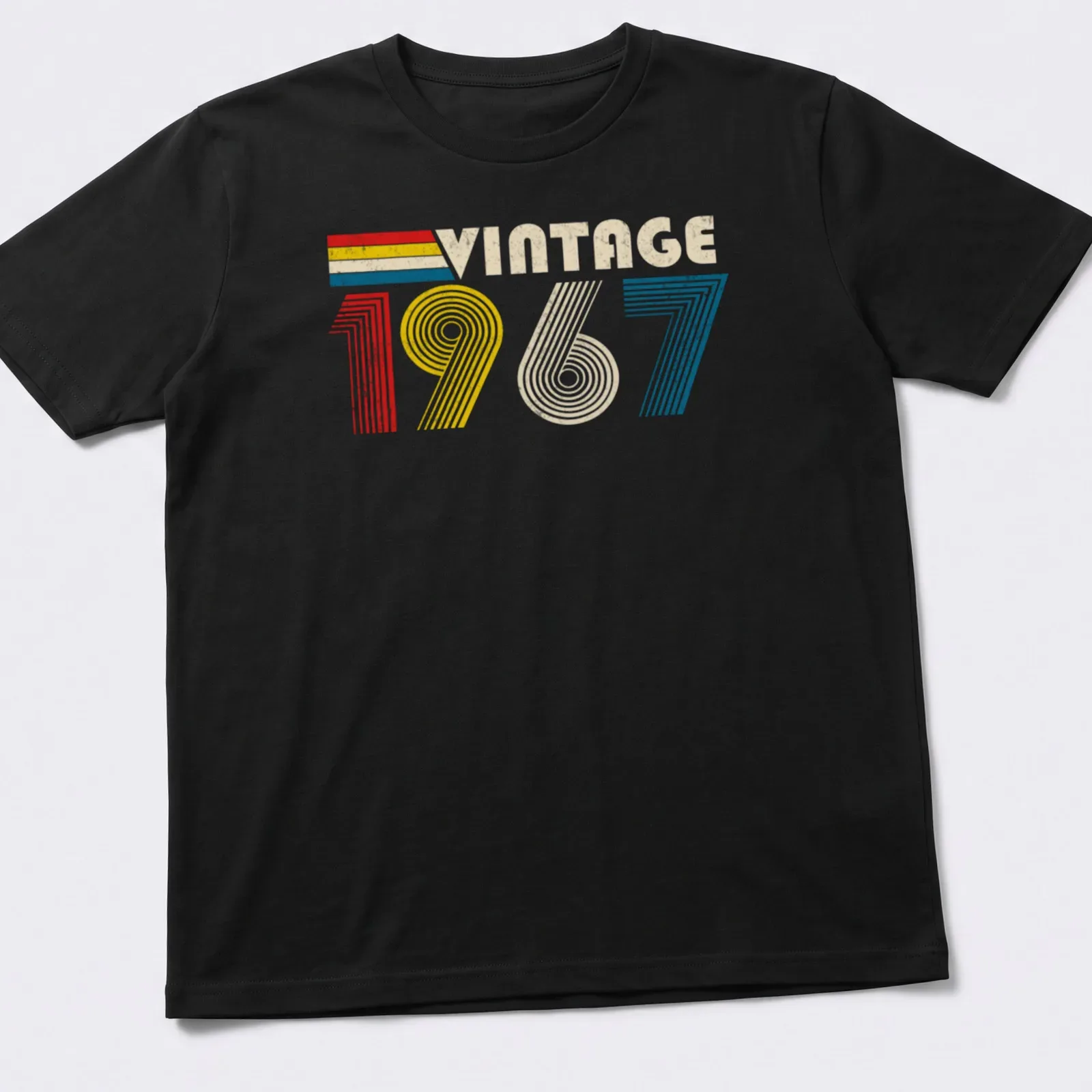 Distressed t-shirt with 'Vintage 1967' text in red, yellow, blue, and cream — printed on a unisex t-shirt