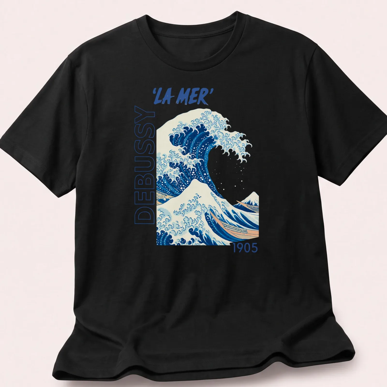 Japanese ukiyo-e style illustration of a wave with 'LA MER' text in blue and white — printed on a unisex t-shirt