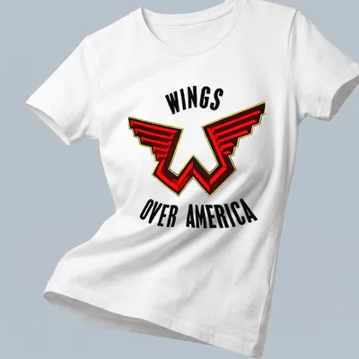 Bold graphic Wings Over America shirt featuring red, black, and yellow colors — printed on a women's shirt